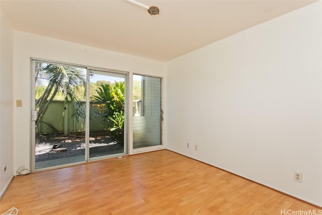 unfurnished room featuring light hardwood / wood-style flooring