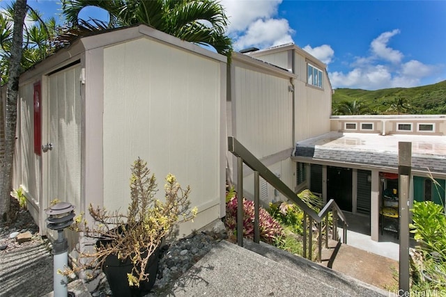 view of side of property featuring a mountain view