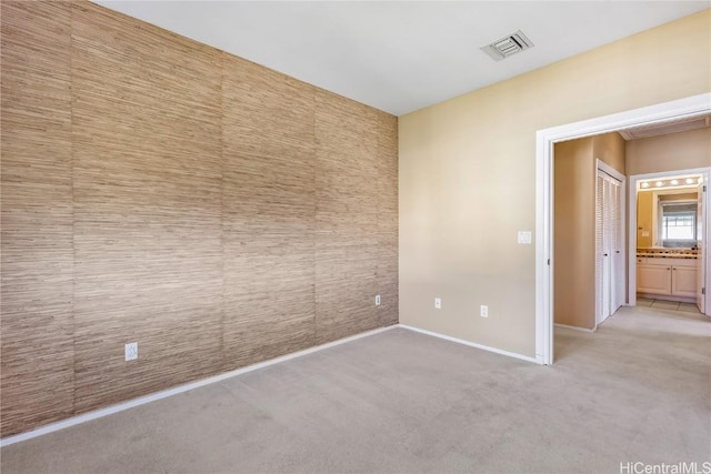 empty room featuring carpet floors