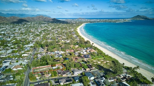 bird's eye view with a water and mountain view and a beach view