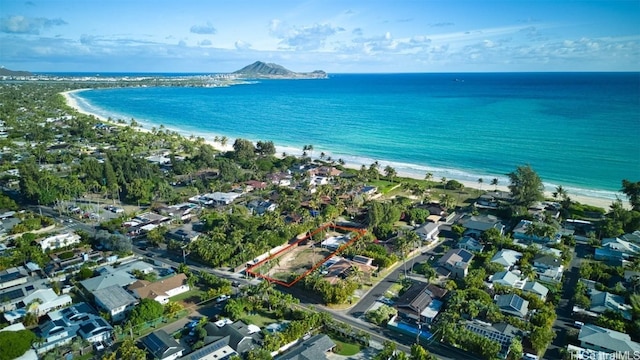 bird's eye view featuring a water view and a view of the beach