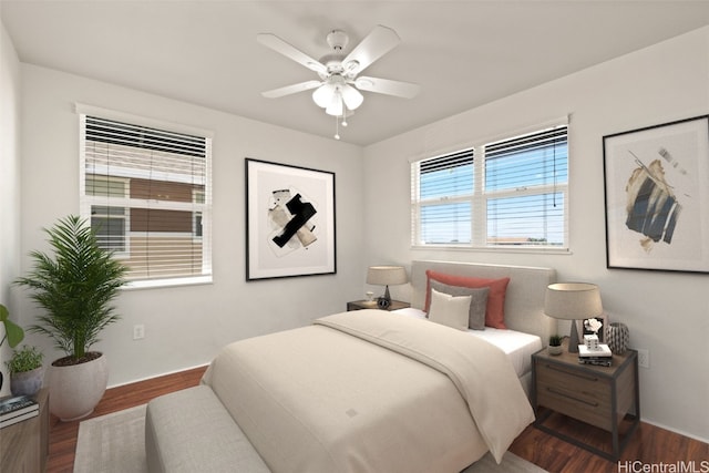 bedroom featuring hardwood / wood-style flooring and ceiling fan