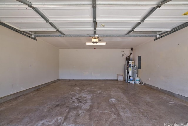 garage with a garage door opener, electric panel, and secured water heater