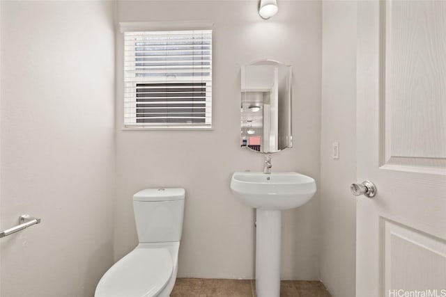 bathroom with sink and toilet