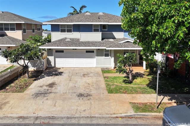 front of property with a garage