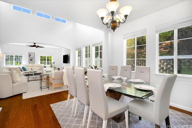 1098 Kuekue St, Honolulu, HI 96825 - dining space with a chandelier, wood finished floors, and ceiling fan