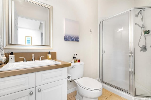 1098 Kuekue St, Honolulu, HI 96825 - full bath with a stall shower, tile patterned flooring, vanity, and toilet