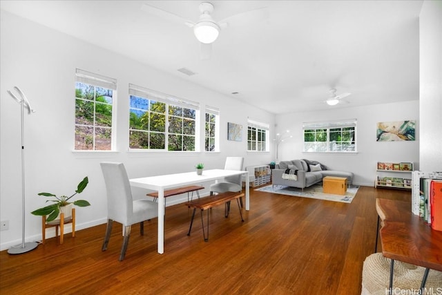 1098 Kuekue St, Honolulu, HI 96825 - dining room featuring ceiling fan, healthy amount of natural light, and dark wood-style floors