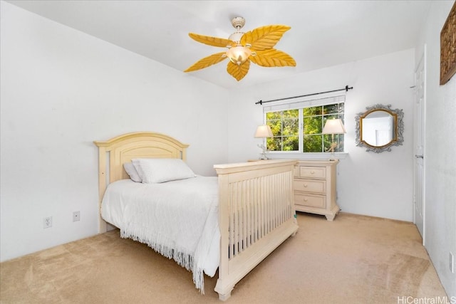 1098 Kuekue St, Honolulu, HI 96825 - bedroom with light carpet and a ceiling fan
