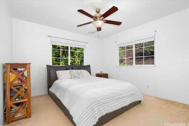 1098 Kuekue St, Honolulu, HI 96825 - bedroom with carpet, multiple windows, and ceiling fan