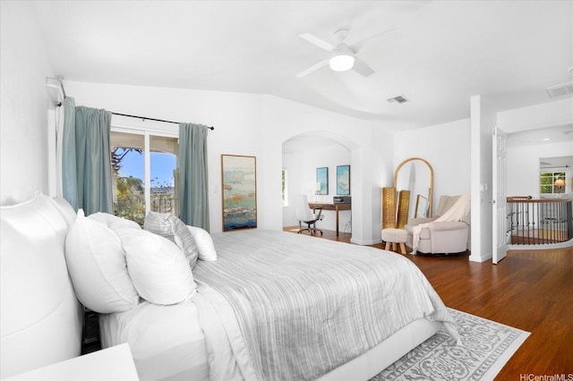 1098 Kuekue St, Honolulu, HI 96825 - bedroom with arched walkways, wood finished floors, multiple windows, ceiling fan, and lofted ceiling