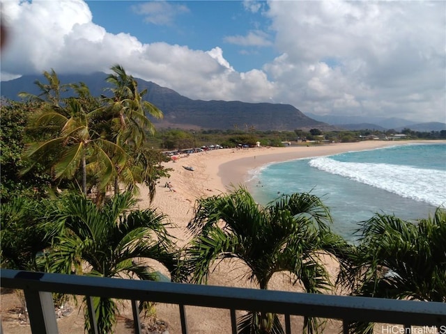 property view of water with a beach view and a mountain view