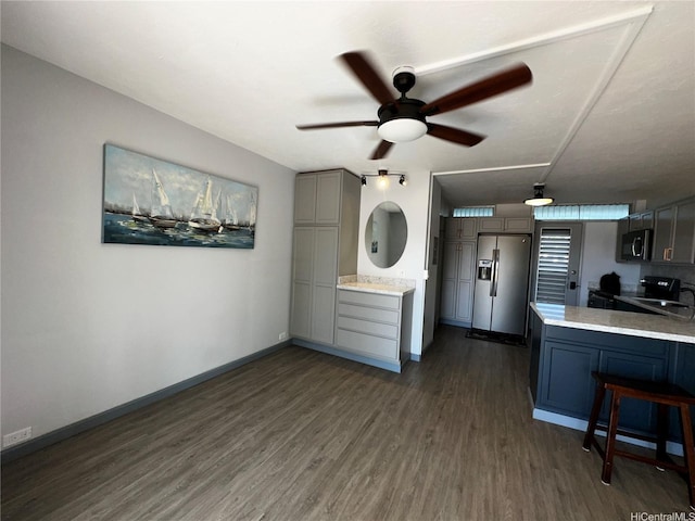 84-265 Farrington Hwy Unit 206, Waianae, HI 96792 - kitchen featuring black appliances, gray cabinetry, a ceiling fan, dark wood-style flooring, and light countertops
