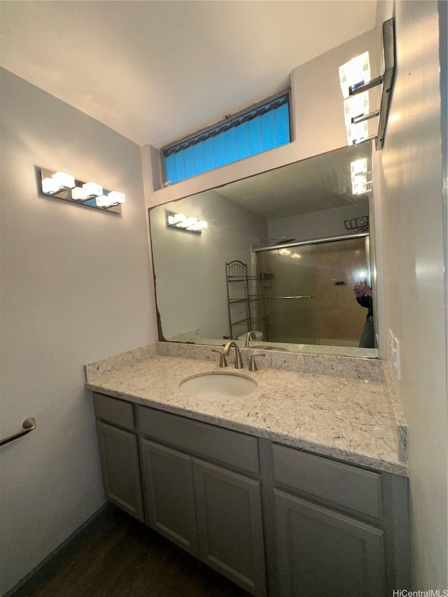 84-265 Farrington Hwy Unit 206, Waianae, HI 96792 - full bath with vanity, an enclosed shower, and wood finished floors