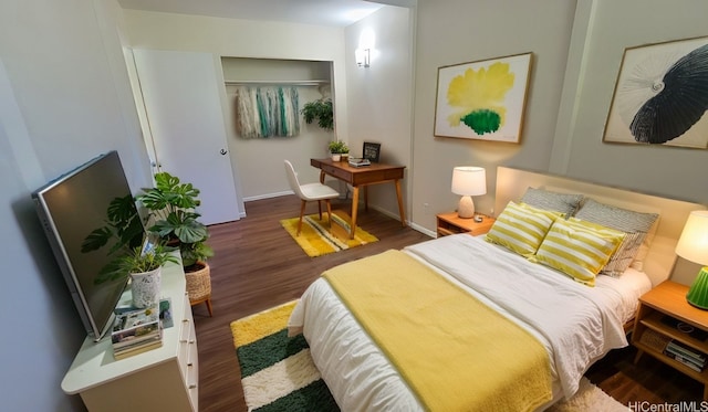 bedroom with dark wood-type flooring