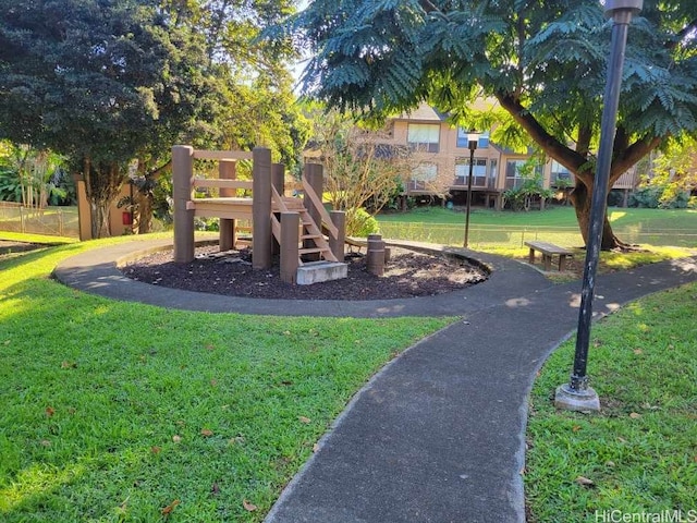 view of playground with a yard