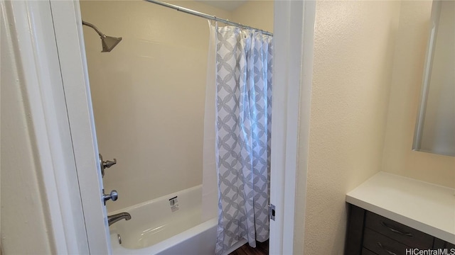 bathroom featuring shower / bathtub combination with curtain