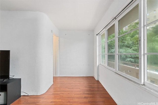 hallway featuring hardwood / wood-style flooring