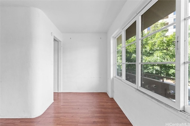 hall featuring wood finished floors