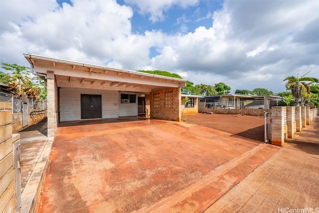 view of patio with an outdoor structure