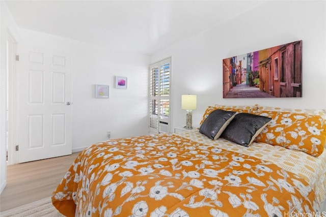 bedroom featuring light wood finished floors