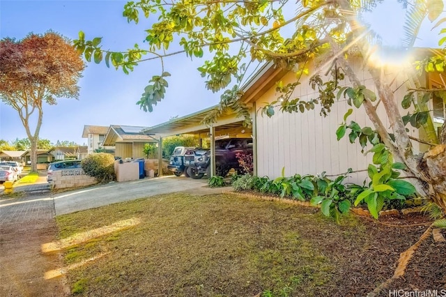 view of yard featuring a carport