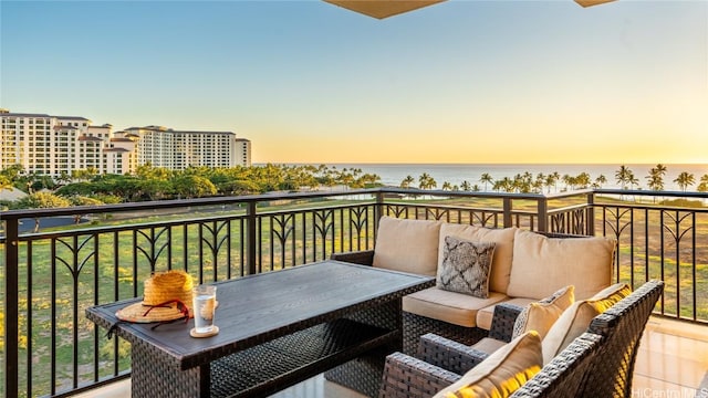 balcony at dusk with a water view