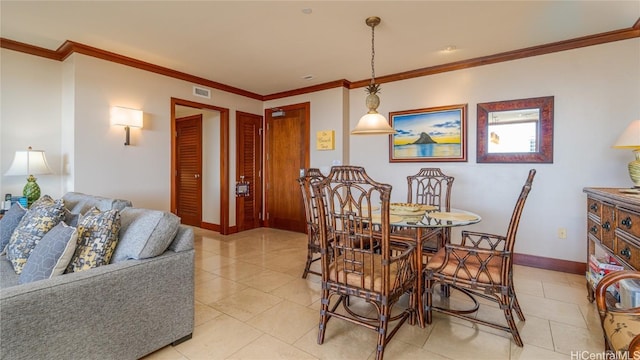 tiled dining space with ornamental molding