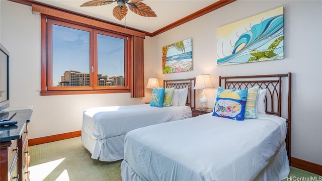 bedroom with crown molding and ceiling fan