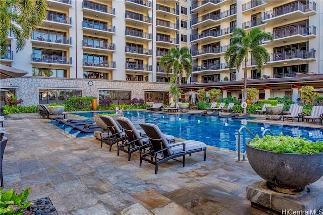 view of swimming pool featuring a patio