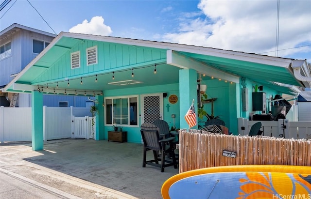 rear view of property with a patio area