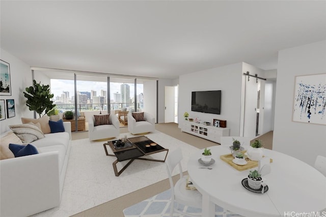 living room featuring floor to ceiling windows, a barn door, and carpet