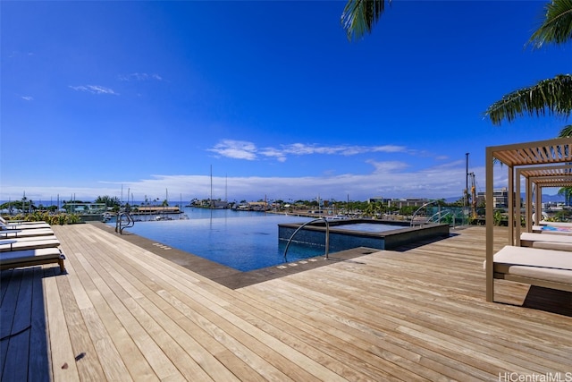 dock area with a water view