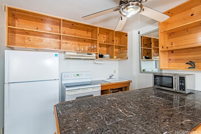 kitchen with ceiling fan, sink, and white appliances