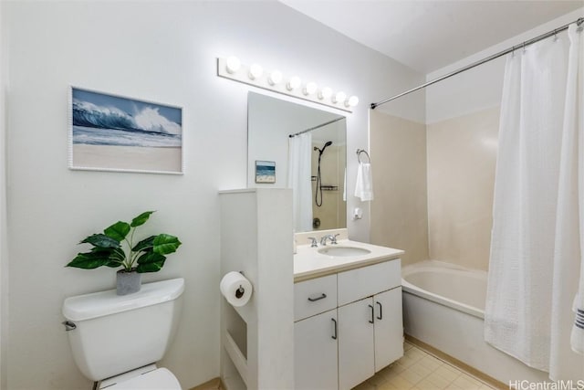 full bathroom with shower / bath combination with curtain, vanity, and toilet