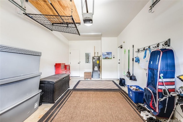 garage featuring a garage door opener, electric panel, and water heater