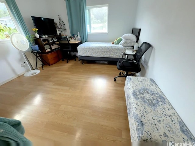 bedroom featuring light wood-type flooring