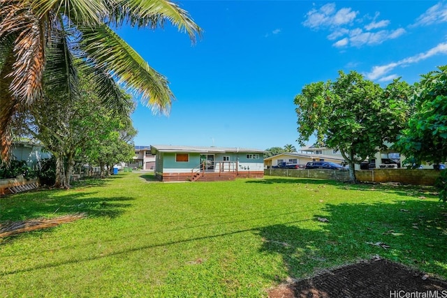 view of yard featuring a deck