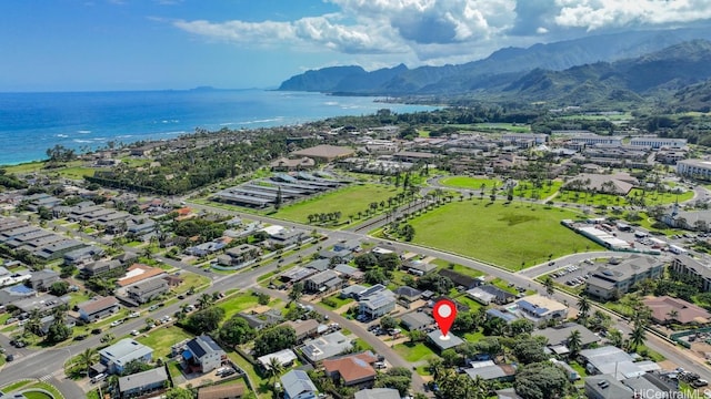 aerial view featuring a water and mountain view