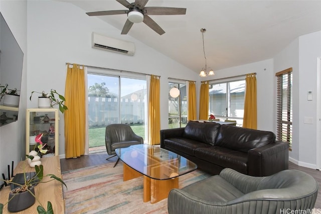 living room with lofted ceiling, wood-type flooring, a wall mounted AC, and ceiling fan with notable chandelier