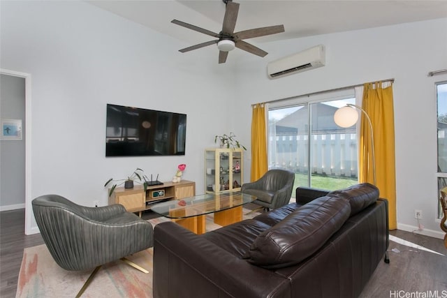 living room featuring ceiling fan, a wall mounted air conditioner, and dark hardwood / wood-style flooring