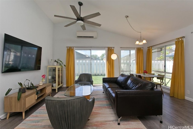 living room featuring lofted ceiling, wood-type flooring, a wall mounted AC, and ceiling fan with notable chandelier