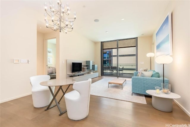 living room featuring hardwood / wood-style flooring and floor to ceiling windows