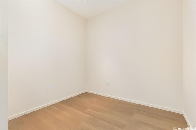 unfurnished room featuring light hardwood / wood-style flooring