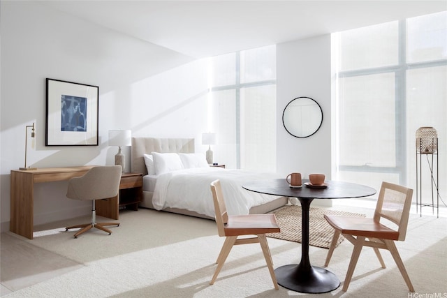 bedroom with light colored carpet