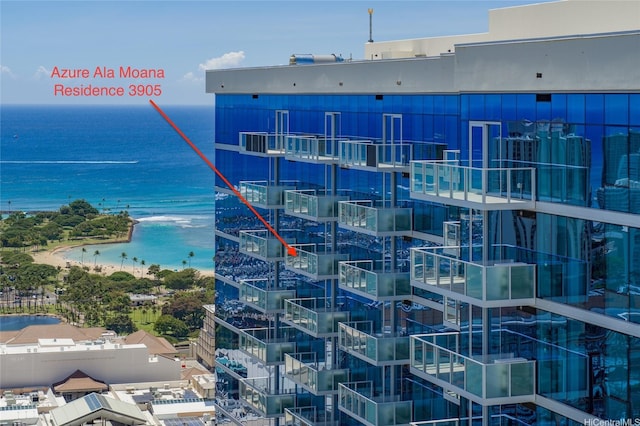 view of building exterior with a water view