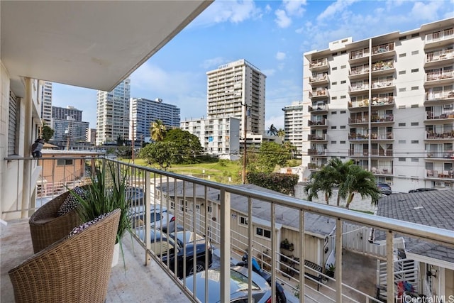 balcony featuring a city view