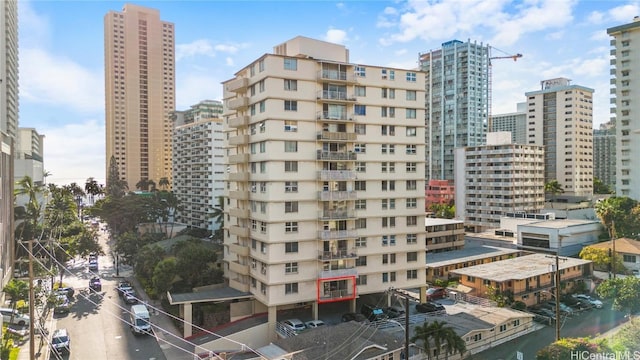 view of building exterior featuring a city view