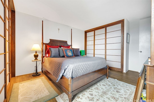 bedroom featuring hardwood / wood-style flooring