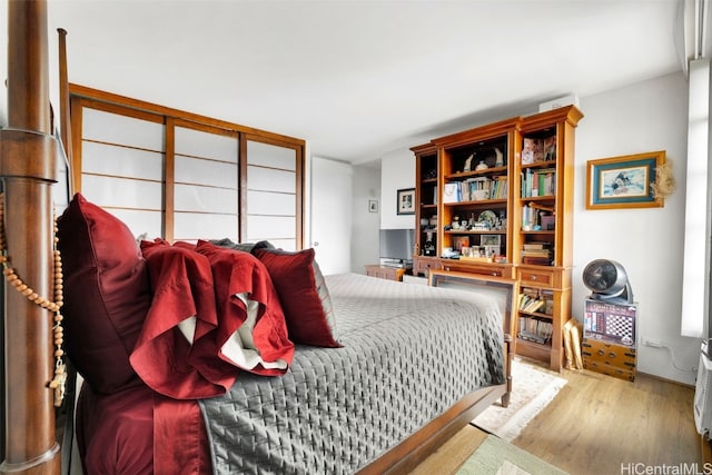 bedroom with light hardwood / wood-style floors